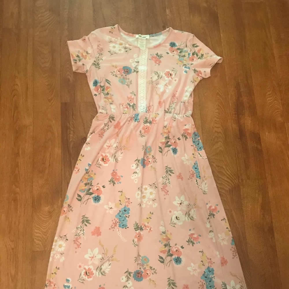 Iam selling this flowerd dress frome ross